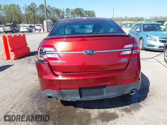 2014 Ford Taurus SEL with VIN 1FAHP2E81EG116790, listed as a IAAI auction lot 41995975 with 131,179 mi miles. Bid and sale history available at carsss.com. Image 16.