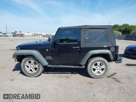 2016 Jeep Wrangler Willys Wheeler z VIN 1C4AJWAG9GL257621, wystawiony jako IAAI lot #41432306 z przebiegiem 84 248 mil mil oraz . Historia ofert i sprzedaży dostępna na DreamBid. Obrazek 14.