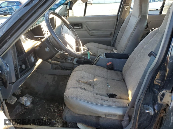 1996 Jeep Cherokee Sport with VIN 1J4FJ68SXTL274898, listed as a Copart auction lot 87676505 with 258,358 mi miles and Salvage Title. Bid and sale history available at carsss.com. Image 7.