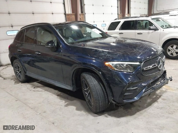 2023 Mercedes-Benz GLC with VIN W1NKM4HB9PF028986, listed as a IAAI auction lot 41611041 with 22,617 mi miles. Bid and sale history available at carsss.com. Image 1.