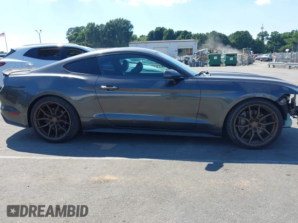 2015 Ford Mustang EcoBoost with VIN 1FA6P8TH8F5394953, listed as a IAAI auction lot 42618352 with 101,302 mi miles and . Bid and sale history available at DreamBid. Image 14.