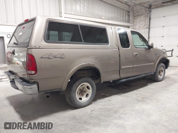 2001 Ford F-150 XL z VIN 1FTRX18W91NB49304, wystawiony jako IAAI lot #42316935 z przebiegiem 258 410 mil mil oraz . Historia ofert i sprzedaży dostępna na DreamBid. Obrazek 4.