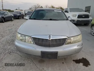 2002 Lincoln Continental with VIN 1LNHM97VX2Y672516, listed as a Copart auction lot 75595354 with 154,361 mi miles and Salvage Title. Bid and sale history available at carsss.com. Image 5.