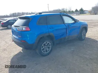 2021 Jeep Cherokee Trailhawk with VIN 1C4PJMBX4MD222987, listed as a IAAI auction lot 41771808 with 52,533 mi miles and . Bid and sale history available at DreamBid. Image 4.