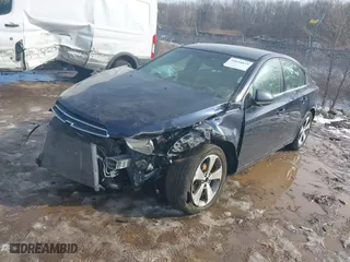 2011 Chevrolet Cruze LT w/2LT with VIN 1G1PG5S93B7215023, listed as a IAAI auction lot 41654819 with 124,443 mi miles. Bid and sale history available at carsss.com. Image 2.