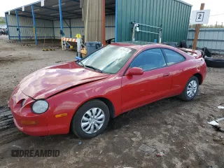 1995 Toyota Celica ST z VIN JT2AT00N7S0042443, wystawiony jako Copart lot #56394475 z przebiegiem 328 515 mil mil oraz Szkody całkowita. Historia ofert i sprzedaży dostępna na DreamBid. Obrazek 1.
