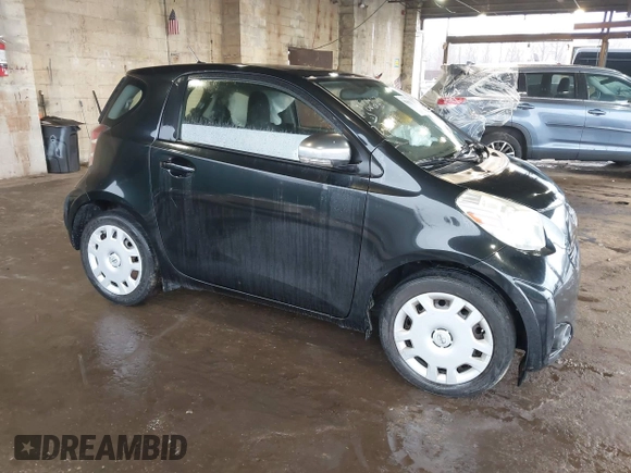 2013 Scion iQ with VIN JTNJJXB08DJ024825, listed as a IAAI auction lot 41842818 with 91,136 mi miles and . Bid and sale history available at DreamBid. Image 1.