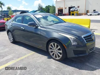 2014 Cadillac ATS Luxury RWD z VIN 1G6AB5RAXE0142079, wystawiony jako IAAI lot #42517963 z przebiegiem 140 118 mil mil oraz . Historia ofert i sprzedaży dostępna na DreamBid. Obrazek 1.