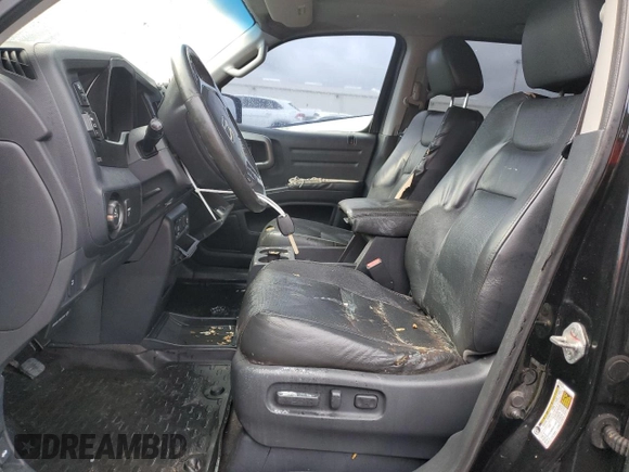 2010 Honda Ridgeline RTL with VIN 5FPYK1F5XAB010390, listed as a Copart auction lot 75039634 with 0 mi miles and Salvage Title. Bid and sale history available at carsss.com. Image 7.