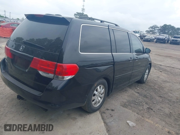 2008 Honda Odyssey EX-L with VIN 5FNRL38758B114588, listed as a IAAI auction lot 42101377 with 306,345 mi miles and . Bid and sale history available at DreamBid. Image 4.
