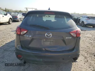 2016 Mazda CX-5 Sport with VIN JM3KE2BE7G0739544, listed as a Copart auction lot 75557244 with 128,336 mi miles and Salvage Title. Bid and sale history available at DreamBid. Image 6.