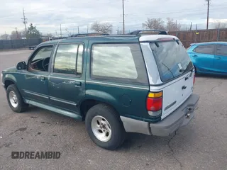 1996 Ford Explorer XL z VIN 1FMDU34X1TUCO1607, wystawiony jako IAAI lot #41182134 z przebiegiem 200 982 mil mil oraz . Historia ofert i sprzedaży dostępna na DreamBid. Obrazek 3.