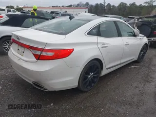 2013 Hyundai Azera with VIN KMHFH4JG0DA216691, listed as a IAAI auction lot 41704694 with 200,228 mi miles and . Bid and sale history available at DreamBid. Image 4.