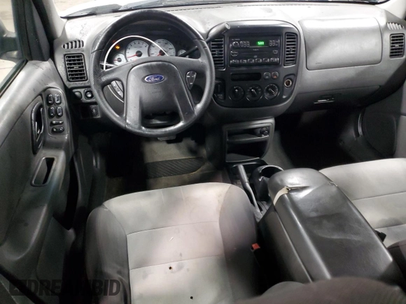 2004 Ford Escape XLS with VIN 1FMYU92164KA28697, listed as a Copart auction lot 87878445 with 156,767 mi miles and Salvage Title. Bid and sale history available at DreamBid. Image 8.
