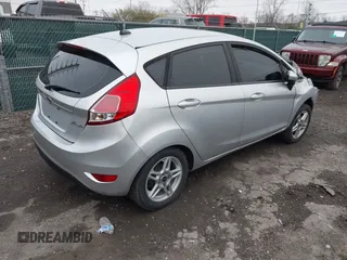2017 Ford Fiesta SE with VIN 3FADP4EJ5HM104763, listed as a IAAI auction lot 42009697 with 117,980 mi miles. Bid and sale history available at carsss.com. Image 4.