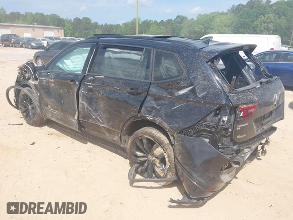 2021 Volkswagen Tiguan SE z VIN 3VV3B7AX5MM027369, wystawiony jako IAAI lot #42082821 z przebiegiem 74 024 mil mil oraz . Historia ofert i sprzedaży dostępna na DreamBid. Obrazek 3.