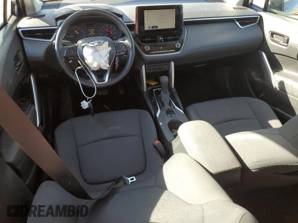 2023 Toyota Corolla Cross LE with VIN 7MUCAAAG8PV060228, listed as a Copart auction lot 86827224 with 40,395 mi miles and Salvage title. Bid and sale history available at DreamBid. Image 8.