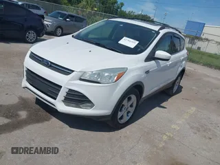 2013 Ford Escape SE with VIN 1FMCU0GX5DUA85464, listed as a IAAI auction lot 42701315 with 158,093 mi miles and . Bid and sale history available at DreamBid. Image 2.