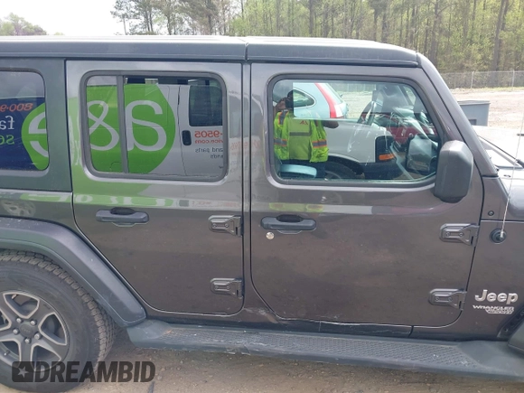 2018 Jeep Wrangler Unlimited Sport S z VIN 1C4HJXDG8JW112639, wystawiony jako IAAI lot #41951965 z przebiegiem 93 853 mil mil oraz . Historia ofert i sprzedaży dostępna na DreamBid. Obrazek 13.
