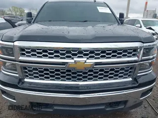 2014 Chevrolet Silverado 1500 LT with VIN 1GCVKREC4EZ327320, listed as a IAAI auction lot 42063939 with 132,317 mi miles and . Bid and sale history available at DreamBid. Image 12.