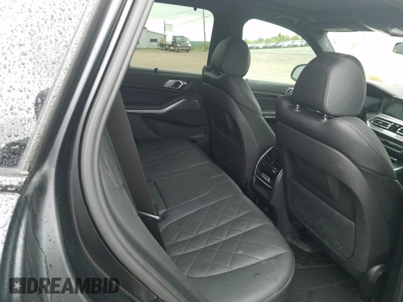 2023 BMW X5 xDrive45e z VIN 5UXTA6C05P9P88254, wystawiony jako Copart lot #56622044 z przebiegiem Nie podano mil oraz Nie do naprawy • Non repairable. Historia ofert i sprzedaży dostępna na DreamBid. Obrazek 11.