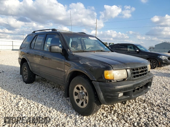 1999 Isuzu Rodeo S with VIN 4S2CK58W3X4362974, listed as a Copart auction lot 43155155 with 396,448 mi miles and Salvage Title. Bid and sale history available at DreamBid. Image 4.
