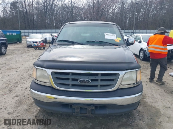 2000 Ford F-150 XL with VIN 1FTZX0725YKA09559, listed as a IAAI auction lot 41810954 with Not provided miles and . Bid and sale history available at DreamBid. Image 12.