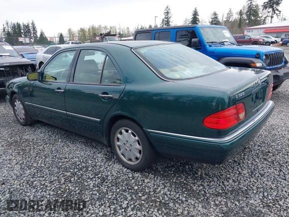1998 Mercedes-Benz E-Class with VIN WDBJF65FXWA589630, listed as a IAAI auction lot 41990725 with 102,149 mi miles. Bid and sale history available at carsss.com. Image 3.