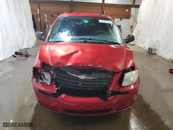 2007 Chrysler Town & Country SWB with VIN 1A4GJ45RX7B245777, listed as a Copart auction lot 55028104 with 179,292 mi miles and Salvage Title. Bid and sale history available at carsss.com. Image 5.