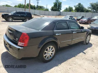 2009 Chrysler 300 with VIN 2C3KA63T39H580730, listed as a Copart auction lot 64933564 with 155,403 mi miles and Salvage Title. Bid and sale history available at carsss.com. Image 3.