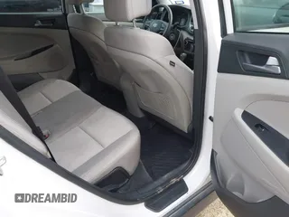 2016 Hyundai Tucson Sport with VIN KM8J33A2XGU242256, listed as a IAAI auction lot 41065573 with 97,503 mi miles. Bid and sale history available at carsss.com. Image 8.