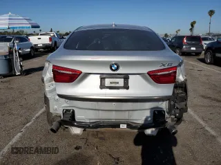 2017 BMW X6 sDrive35i z VIN 5UXKU0C38H0G68189, wystawiony jako Copart lot #52088965 z przebiegiem 71 360 mil mil oraz Szkoda całkowita • Salvage title. Historia ofert i sprzedaży dostępna na DreamBid. Obrazek 6.