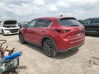 2018 Mazda CX-5 Touring with VIN JM3KFACM8J1469772, listed as a Copart auction lot 54863415 with 97,592 mi miles and Salvage Title. Bid and sale history available at carsss.com. Image 2.