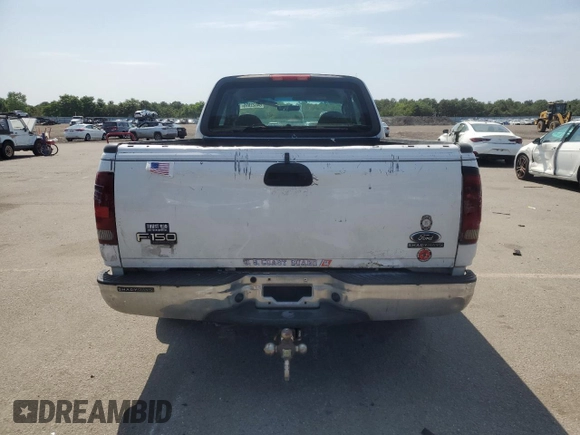 2004 Ford F-150 XL with VIN 2FTRX17W54CA63466, listed as a Copart auction lot 64022895 with 329,377 mi miles and Salvage title. Bid and sale history available at DreamBid. Image 6.