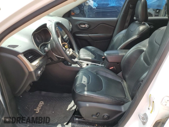 2014 Jeep Cherokee Limited with VIN 1C4PJMDS0EW140309, listed as a Copart auction lot 59203385 with 116,058 mi miles and Salvage title. Bid and sale history available at DreamBid. Image 7.