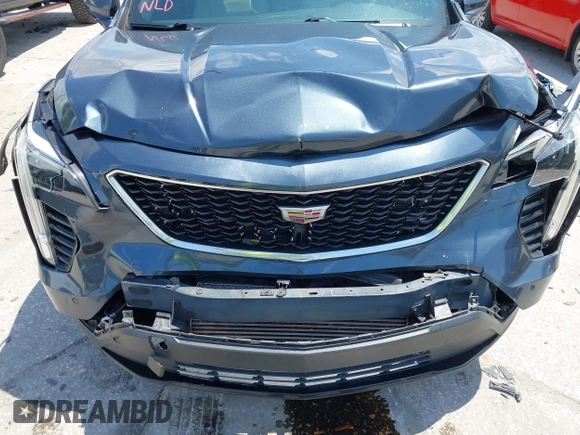 2019 Cadillac XT4 FWD Sport with VIN 1GYFZER42KF107032, listed as a IAAI auction lot 42193557 with 96,615 mi miles and . Bid and sale history available at DreamBid. Image 6.