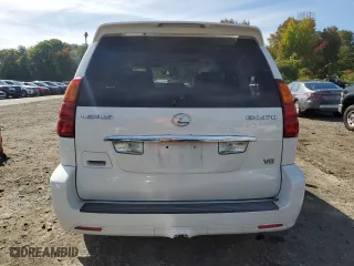 2004 Lexus GX 470 with VIN JTJBT20XX40033938, listed as a Copart auction lot 70871164 with 214,565 mi miles and Salvage Title. Bid and sale history available at carsss.com. Image 6.