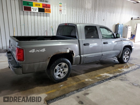 2005 Dodge Dakota SLT z VIN 1D7HW48N95S166589, wystawiony jako Copart lot #54868565 z przebiegiem 228 682 mil mil oraz Szkoda całkowita • Salvage title. Historia ofert i sprzedaży dostępna na DreamBid. Obrazek 3.