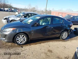 2012 Mazda Mazda3 i Grand Touring with VIN JM1BL1W82C1631267, listed as a IAAI auction lot 41633356 with 158,861 mi miles. Bid and sale history available at carsss.com. Image 15.
