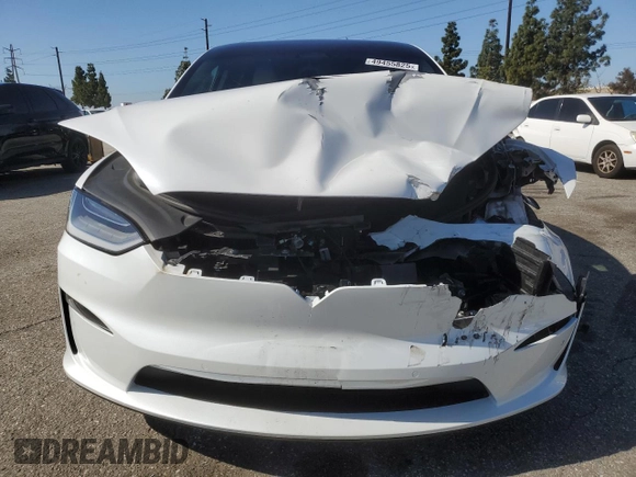 2023 Tesla Model X with VIN 7SAXCDE52PF378496, listed as a Copart auction lot 49455825 with Not Provided miles and Salvage Title. Bid and sale history available at DreamBid. Image 5.