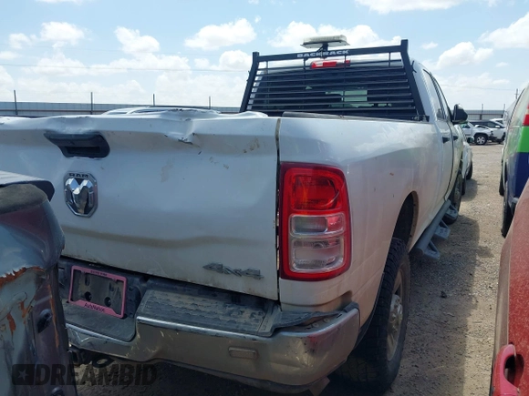 2022 Ram 2500 Tradesman with VIN 3C6UR5HJXNG117791, listed as a IAAI auction lot 42508516 with 61,463 mi miles and . Bid and sale history available at DreamBid. Image 4.