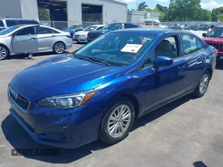 2017 Subaru Impreza Premium z VIN 4S3GKAB64H3621204, wystawiony jako IAAI lot #42313988 z przebiegiem 126 626 mil mil oraz . Historia ofert i sprzedaży dostępna na DreamBid. Obrazek 2.