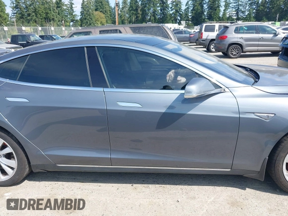 2014 Tesla Model S 60 with VIN 5YJSA1H18EFP38078, listed as a IAAI auction lot 42748619 with 159,285 mi miles and . Bid and sale history available at DreamBid. Image 13.