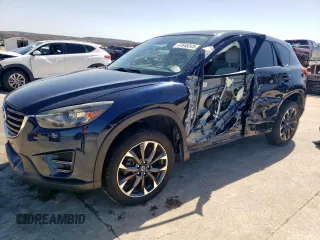 2016 Mazda CX-5 Grand Touring with VIN JM3KE2DY5G0660610, listed as a Copart auction lot 47648345 with 70,663 mi miles and Salvage Title. Bid and sale history available at carsss.com. Image 1.