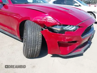 2021 Ford Mustang EcoBoost with VIN 1FA6P8TH7M5125744, listed as a IAAI auction lot 42520877 with 31,953 mi miles and . Bid and sale history available at DreamBid. Image 6.
