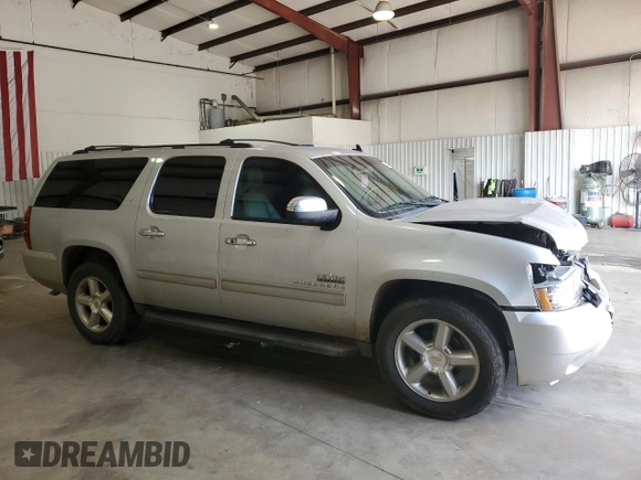 2014 Chevrolet Suburban LT with VIN 1GNSCJE07ER140989, listed as a Copart auction lot 44506315 with 162,490 mi miles and Salvage Title. Bid and sale history available at carsss.com. Image 4.