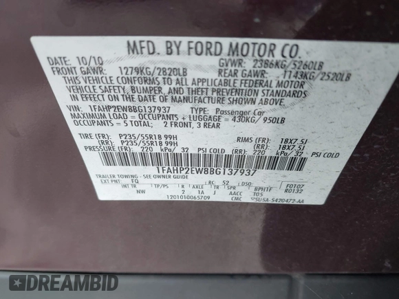 2011 Ford Taurus SEL with VIN 1FAHP2EW8BG137937, listed as a IAAI auction lot 42107586 with 143,525 mi miles. Bid and sale history available at carsss.com. Image 9.