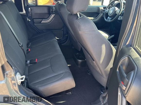 2018 Jeep Wrangler JK Unlimited Sport S with VIN 1C4BJWDG8JL890974, listed as a Copart auction lot 76051434 with 26,581 mi miles and Salvage Title. Bid and sale history available at carsss.com. Image 6.