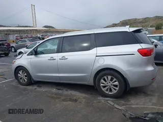 2016 Kia Sedona LX with VIN KNDMB5C13G6212492, listed as a IAAI auction lot 41793029 with 99,176 mi miles. Bid and sale history available at carsss.com. Image 13.
