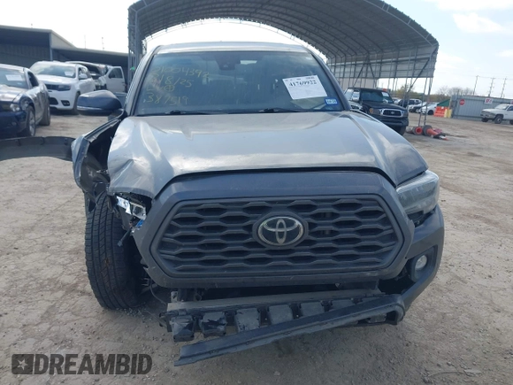 2021 Toyota Tacoma 4WD SR with VIN 3TMCZ5AN4MM387519, listed as a IAAI auction lot 41769922 with 61,813 mi miles. Bid and sale history available at carsss.com. Image 13.